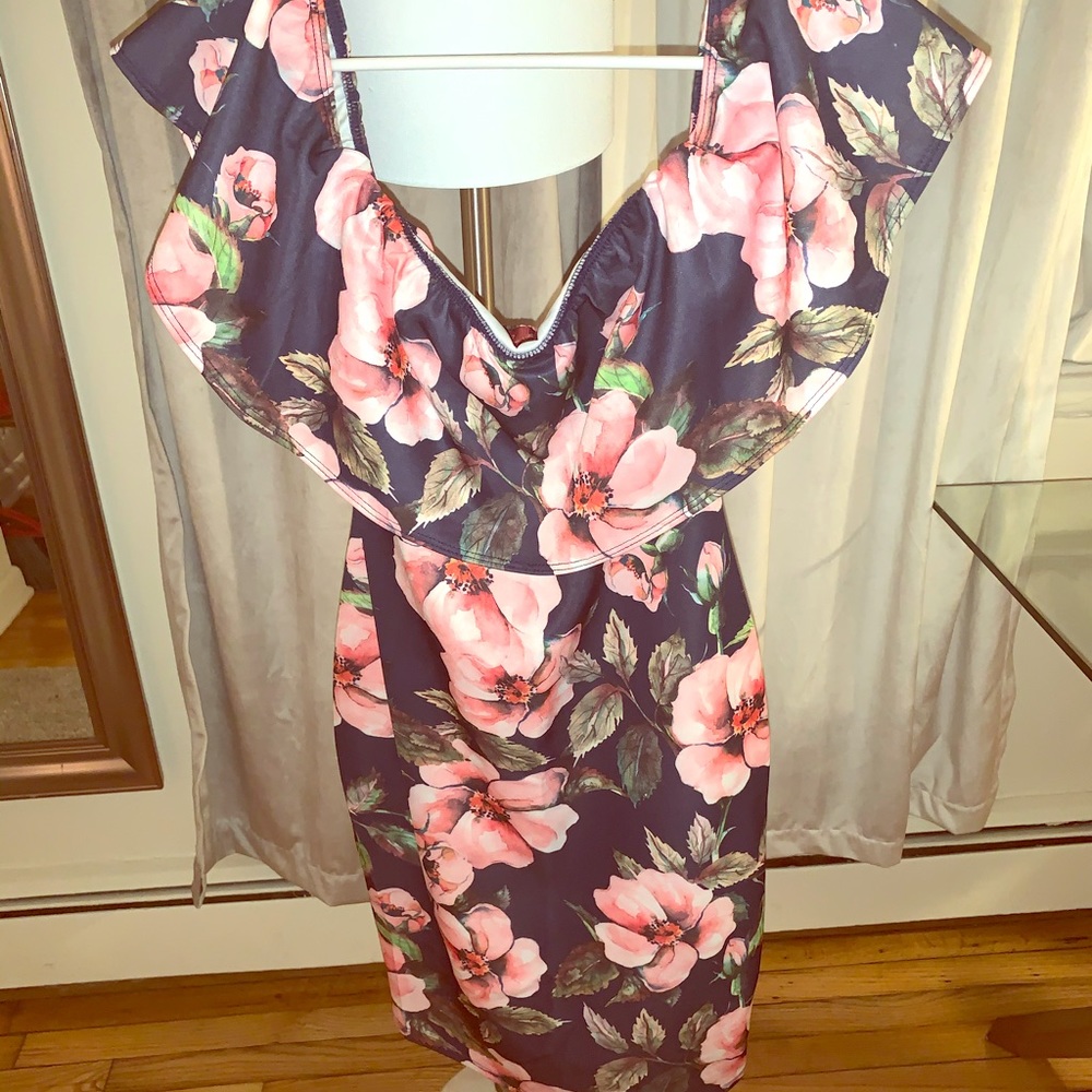 Off the shoulder floral mini dress.